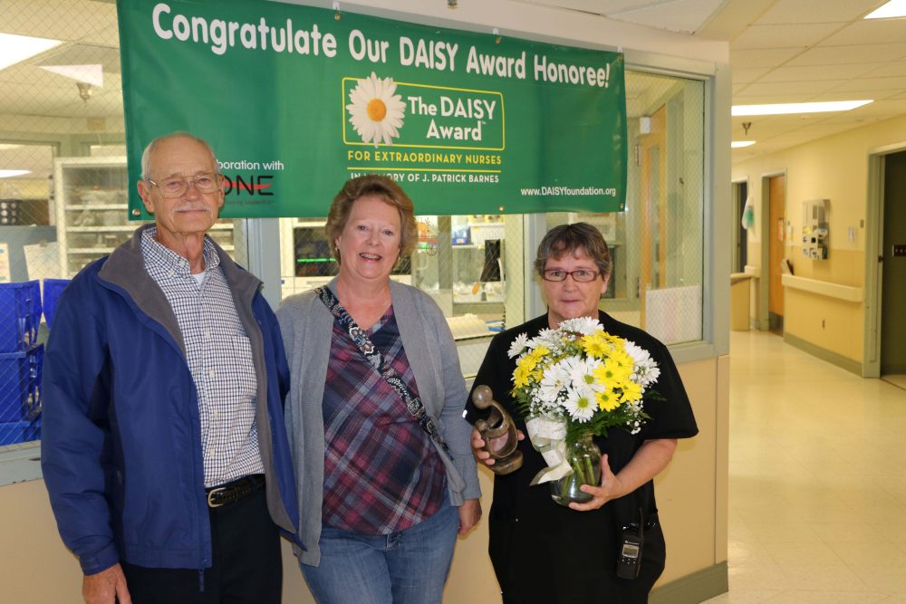 Bothwell Regional Health Center RN Linda Lower is the latest recipient of the prestigious DAISY Award for Extraordinary Nurses. Lower was nominated by Carla Jackson for providing care and compassion to her mother, Nedra Zimmerschied. From left, Jackson’s father, Carl Zimmerschied, Carla Jackson and Linda Lower.