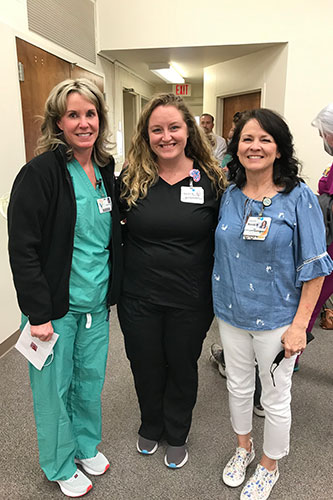 Lauren Thiel-Payne, Bothwell Foundation executive director, center, with Pat Gaunt Nursing Scholarship recipients Serena Cronk, left, and Stacey O’Donnell, right. Recipient Cary Hovendick is not pictured.