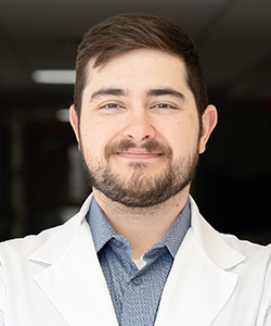 Dr. Walley professional photo in a white coat
