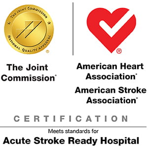 The Joint Commission logo and American Heart Association logo