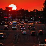 Cars on Highway 65 and Highway 50 at dusk