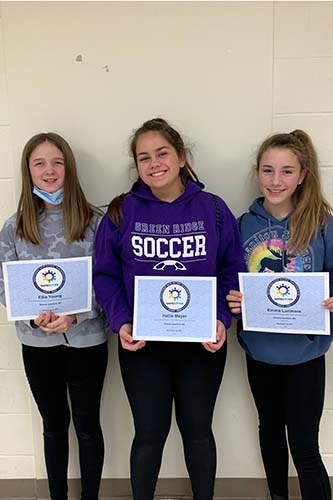 Three Bothwell Safe Sitter students holding their certificates