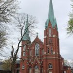 A Sedalia church on a street corner on a cloudy winter day